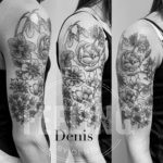 tattoo haut du bras fleurs